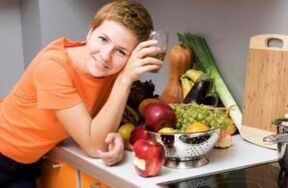 Girl at table with useful products